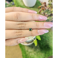 0.61 Ct. Yellowish Green Sapphire from Madagascar Life Style