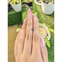 0.51 Ct. Yellowish Green Sapphire from Madagascar Life Style