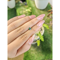 0.51 Ct. Yellowish Green Sapphire from Madagascar Life Style