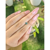 0.56 Ct. Yellowish Green Sapphire from Madagascar Life Style