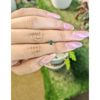 0.56 Ct. Yellowish Green Sapphire from Madagascar Life Style