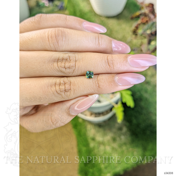 0.56 Ct. Yellowish Green Sapphire from Madagascar