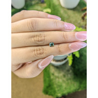 0.58 Ct. Bluish Green Sapphire from Madagascar Life Style