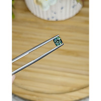 0.58 Ct. Bluish Green Sapphire from Madagascar Life Style