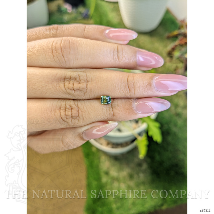 0.67 Ct. Yellowish Green Sapphire from Madagascar