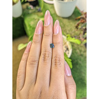 0.84 Ct. Greenish Blue Sapphire from Madagascar Life Style