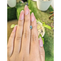 0.78 Ct. Bluish Green Sapphire from Madagascar Life Style