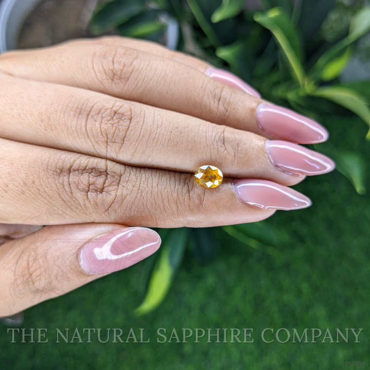 1.12 Ct. Orangish Yellow Sapphire from Ceylon (Sri Lanka)