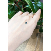 0.38 Ct. Bluish Green Sapphire from Thailand Life Style