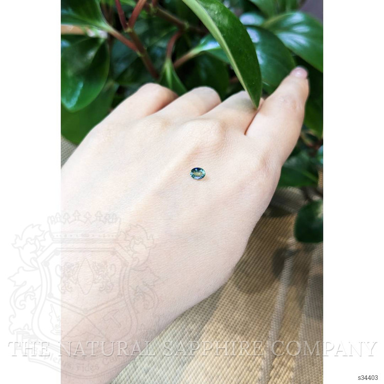 0.38 Ct. Bluish Green Sapphire from Thailand