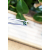 0.38 Ct. Bluish Green Sapphire from Thailand Life Style