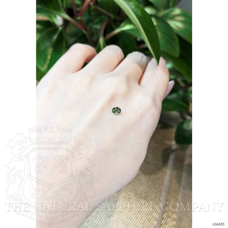 0.39 Ct. Yellowish Green Sapphire from Thailand