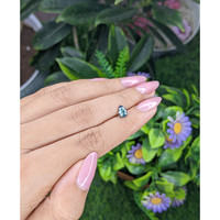 0.93 Ct. Bluish Green Sapphire from Madagascar Life Style