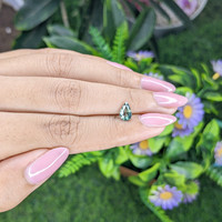 1.06 Ct. Bluish Green Sapphire from Madagascar Life Style