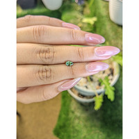 0.54 Ct. Green Sapphire from Madagascar Life Style