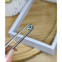 0.72 Ct. Yellowish Green Sapphire from Madagascar Life Style