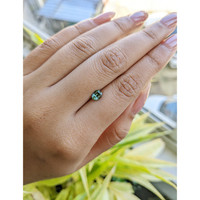 0.72 Ct. Yellowish Green Sapphire from Madagascar Life Style