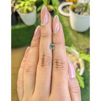 0.72 Ct. Yellowish Green Sapphire from Madagascar Life Style