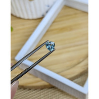 0.73 Ct. Greenish Blue Sapphire from Madagascar Life Style