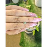 0.72 Ct. Yellowish Green Sapphire from Madagascar Life Style