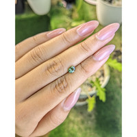 0.84 Ct. Yellowish Green Sapphire from Madagascar Life Style