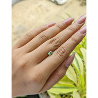 0.80 Ct. Yellowish Green Sapphire from Madagascar Life Style