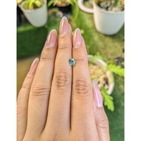 0.66 Ct. Bluish Green Sapphire from Madagascar Life Style