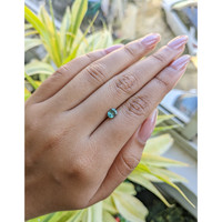 0.66 Ct. Bluish Green Sapphire from Madagascar Life Style