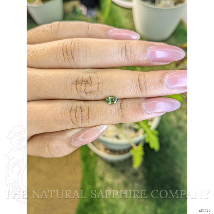 0.61 Ct. Yellowish Green Sapphire from Madagascar