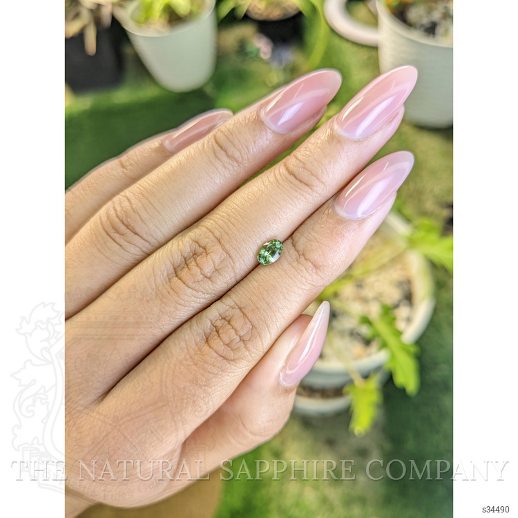 0.61 Ct. Yellowish Green Sapphire from Madagascar