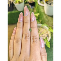 0.61 Ct. Yellowish Green Sapphire from Madagascar Life Style