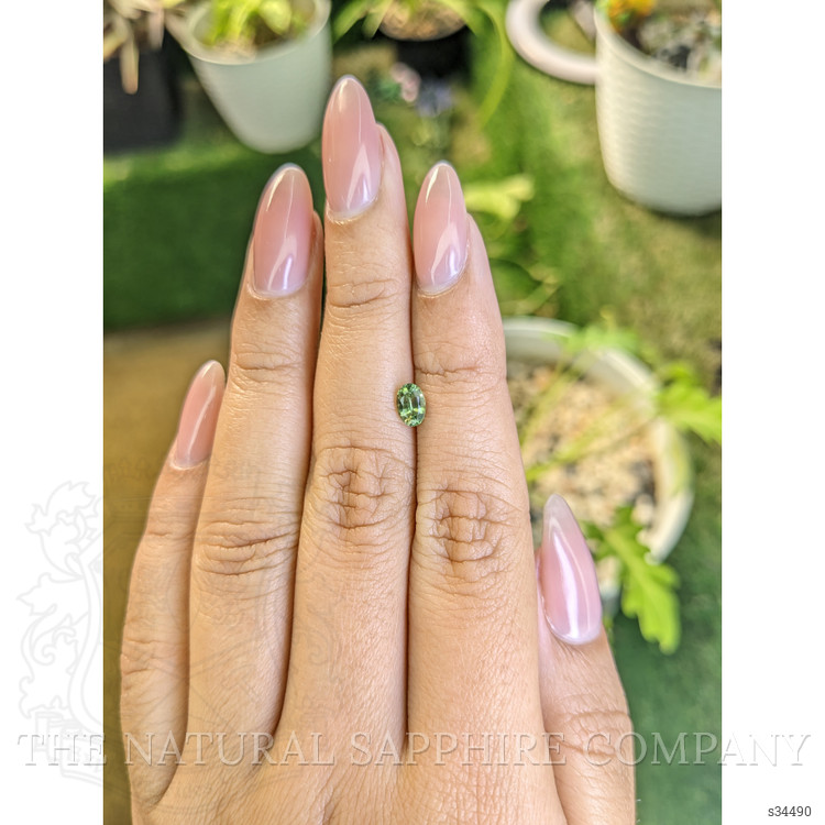 0.61 Ct. Yellowish Green Sapphire from Madagascar