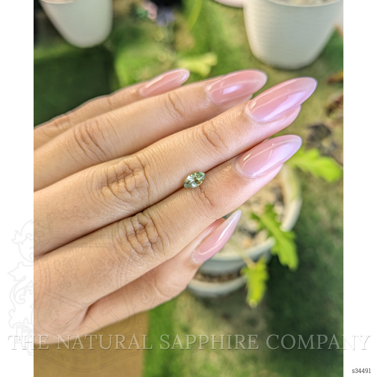 0.55 Ct. Yellowish Green Sapphire from Madagascar