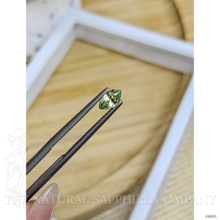 0.55 Ct. Yellowish Green Sapphire from Madagascar