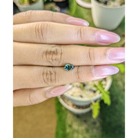 0.95 Ct. Bluish Green Sapphire from Madagascar Life Style