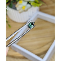 0.95 Ct. Bluish Green Sapphire from Madagascar Life Style