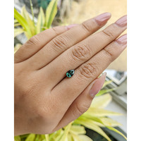 0.95 Ct. Bluish Green Sapphire from Madagascar Life Style