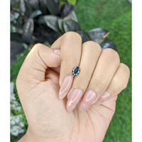 0.92 Ct. Greenish Blue Sapphire from Madagascar Life Style