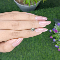 0.81 Ct. Yellowish Green Sapphire from Madagascar Life Style