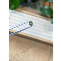 0.70 Ct. Bluish Green Sapphire from Madagascar Life Style