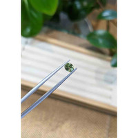0.69 Ct. Green Sapphire from Madagascar Life Style