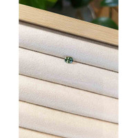 0.49 Ct. Yellowish Green Sapphire from Madagascar Life Style