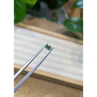 0.56 Ct. Bluish Green Sapphire from Madagascar Life Style