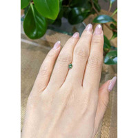 0.56 Ct. Bluish Green Sapphire from Madagascar Life Style