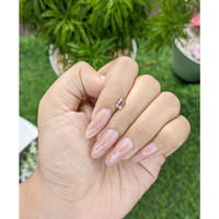 0.59 Ct. Peach Sapphire from Madagascar Life Style