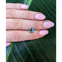 1.84 Ct. Bluish Green Sapphire from Madagascar Life Style