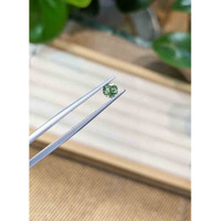 0.61 Ct. Green Sapphire from Madagascar Life Style