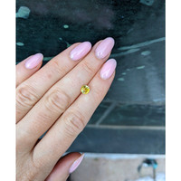 0.93 Ct. Greenish Yellow Sapphire from Ceylon (Sri Lanka) Life Style