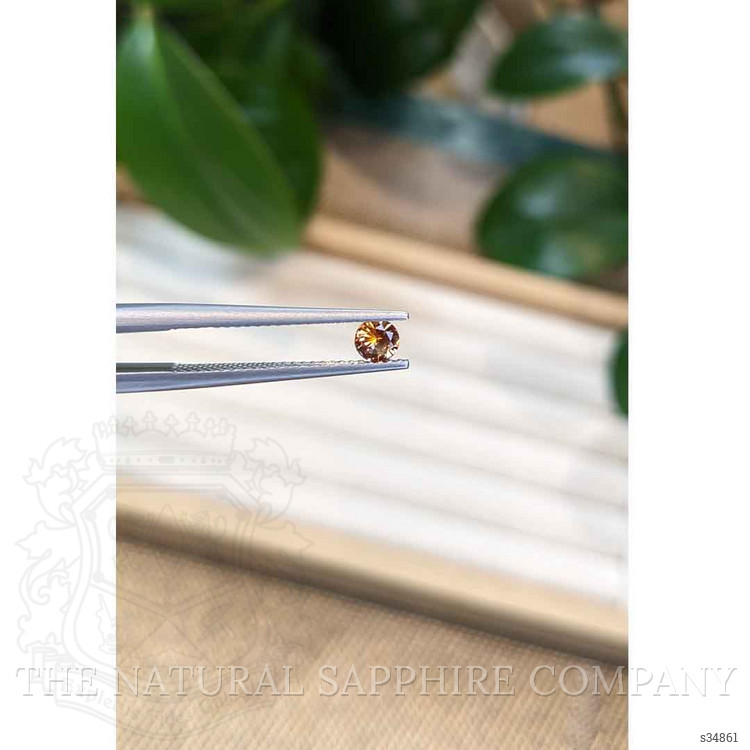 0.26 Ct. Yellowish Orange Sapphire from Montana