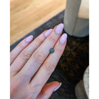 1.17 Ct. Bluish Green Sapphire from Madagascar Life Style